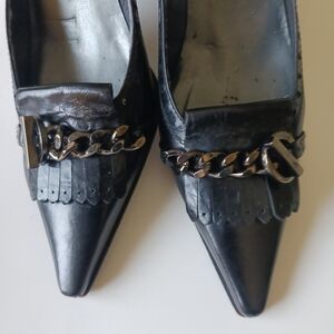 Stuart Weitzman Black Pointed Leather Loafers with Brass Chain